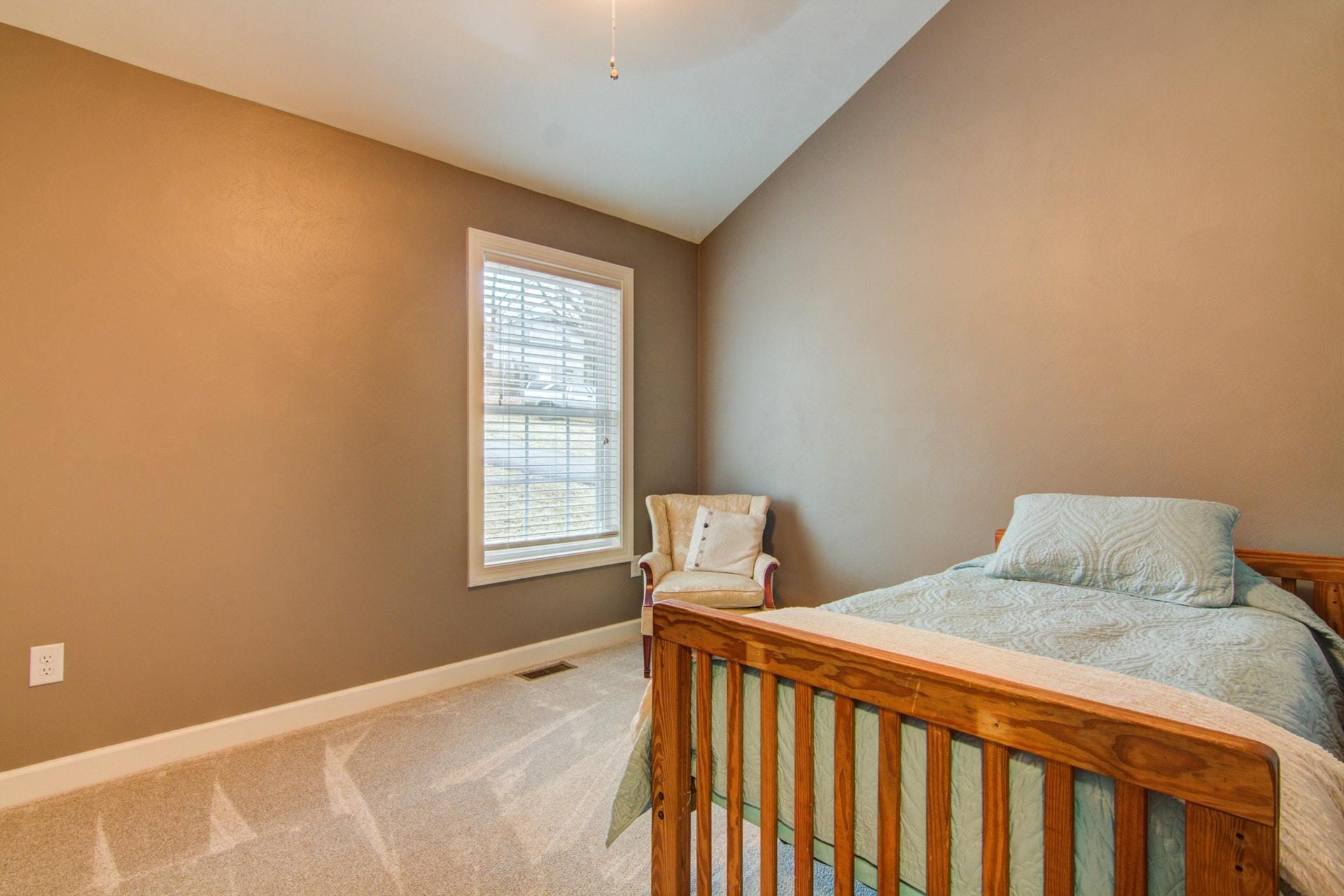 1847 Redwood Road Southeast Roanoke, VA 24014 - Photo 13 of 33 a bedroom with a bed and a window