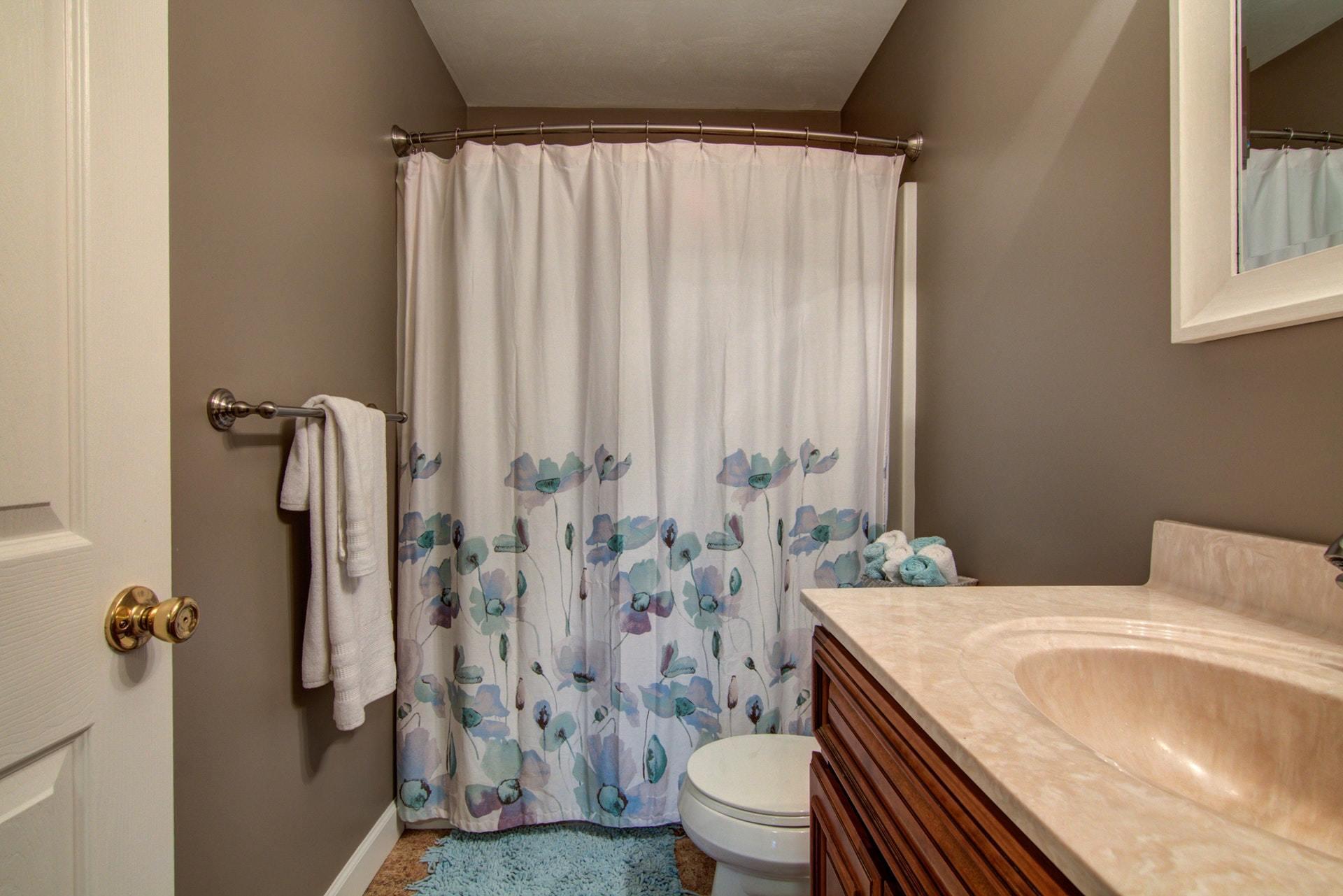 1847 Redwood Road Southeast Roanoke, VA 24014 - Photo 16 of 33 a bathroom with a granite countertop sink toilet and shower
