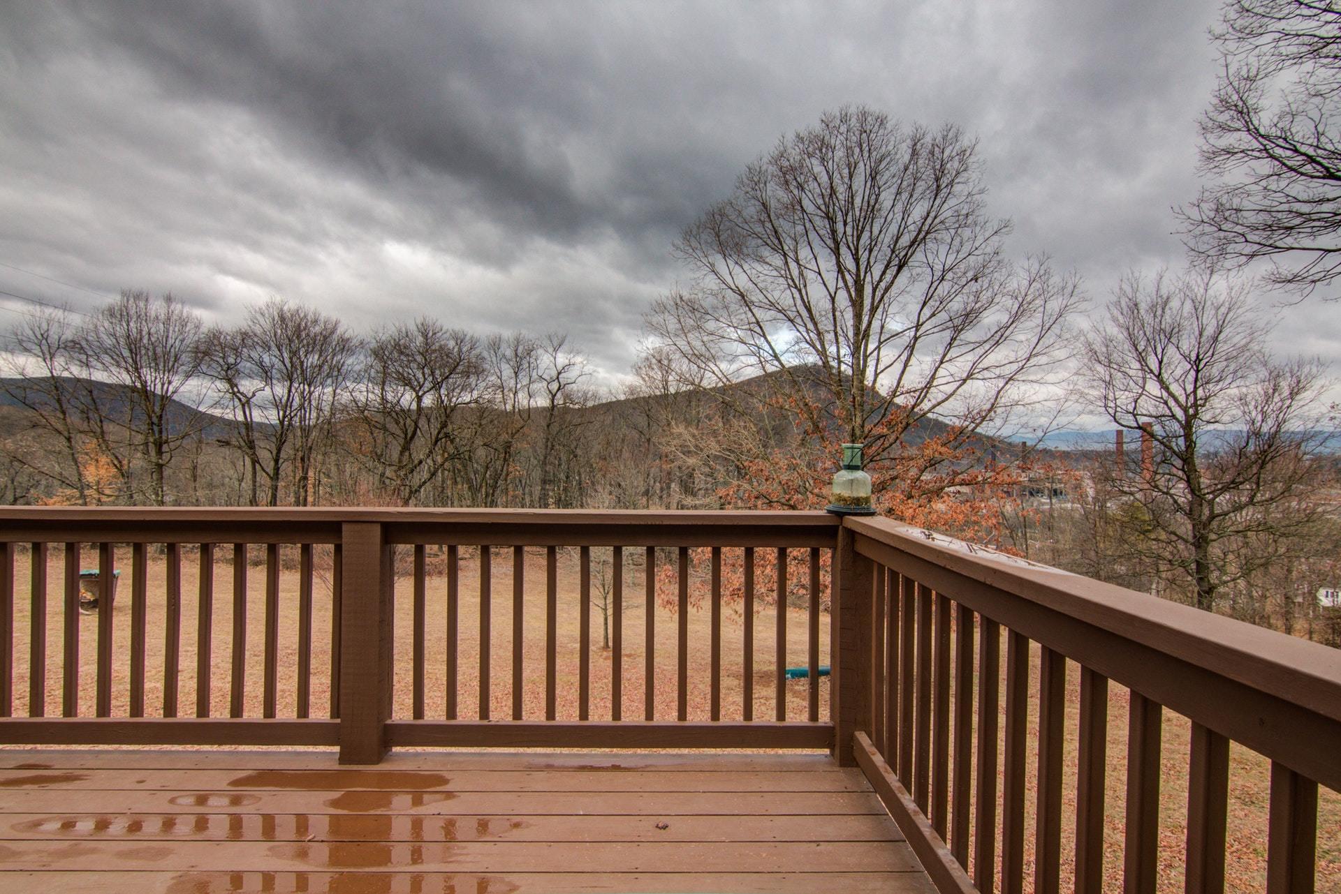 1847 Redwood Road Southeast Roanoke, VA 24014 - Photo 10 of 33 a balcony with wooden floor and fence
