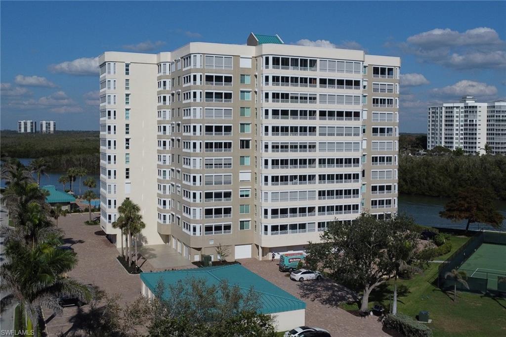 25 Bluebill Avenue, Unit A906 Naples, FL 34108 - Photo 33 of 40 a front view of a building