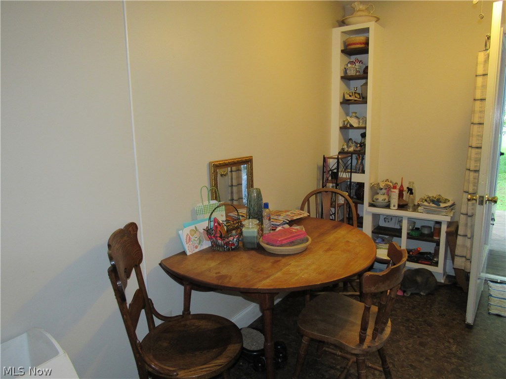 48-50 Hurst Road Painesville, OH 44077 - Photo 21 of 34 Neutral eat-in kitchen with built-in shelves