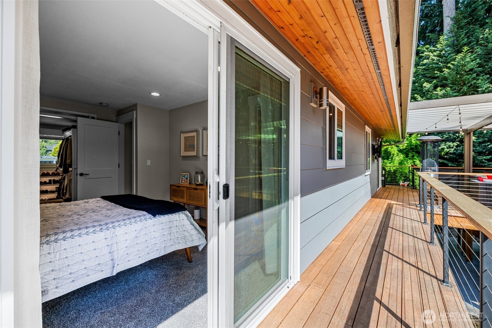 106 234th Place Southeast Bothell, WA 98021 - Photo 19 of 38 a bedroom with a bed and wooden floor