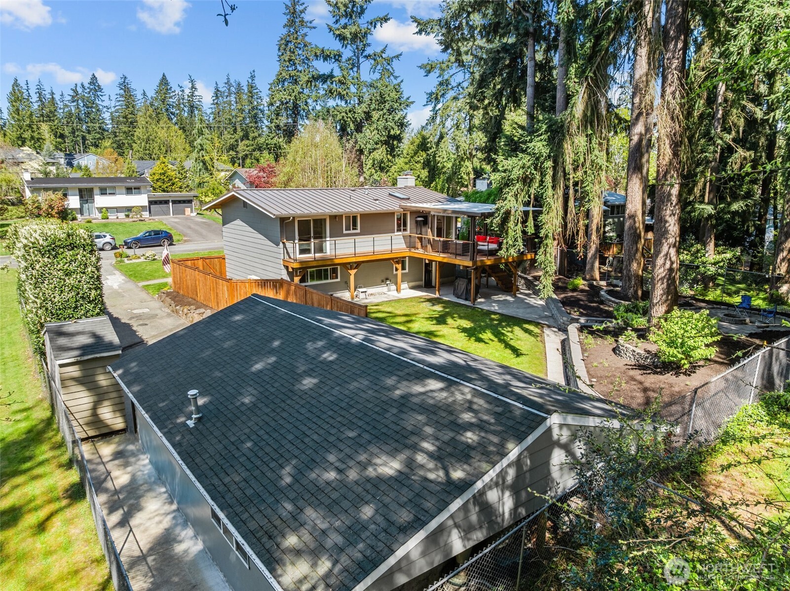 106 234th Place Southeast Bothell, WA 98021 - Photo 34 of 38 swimming pool view with a seating space and a garden view