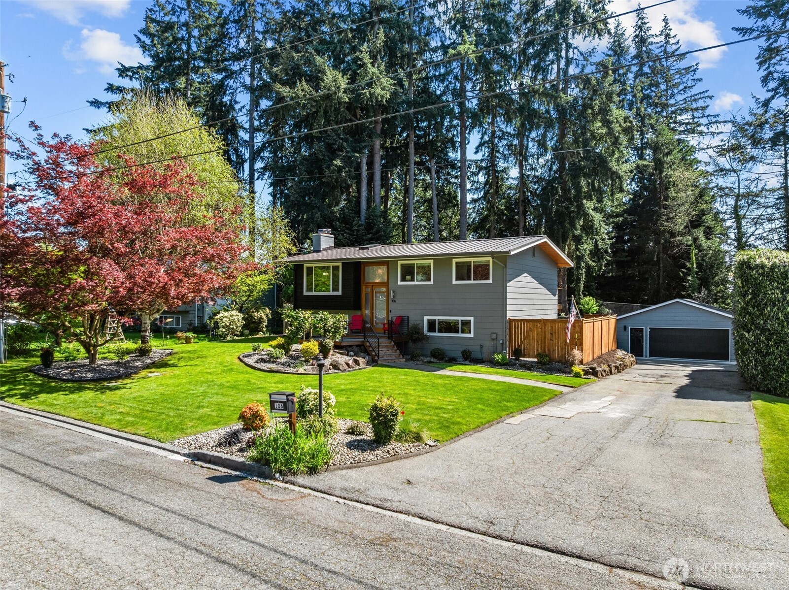 106 234th Place Southeast Bothell, WA 98021 - Photo 36 of 38 a front view of house with yard and green space