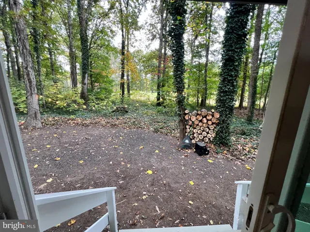 a view of a living room and hardwood floor