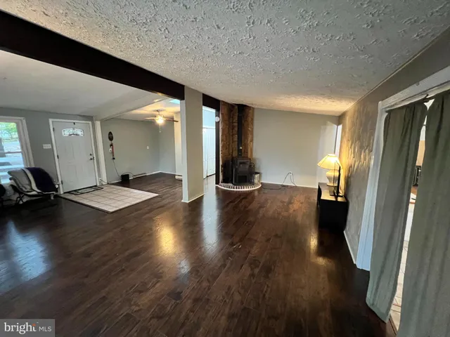 a kitchen with a sink appliances and cabinets