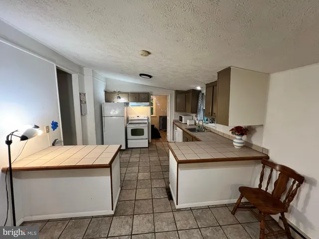 a utility room with a washer and dryer