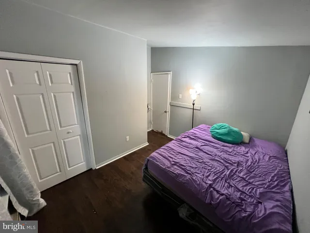 a view of a lake with houses in the background