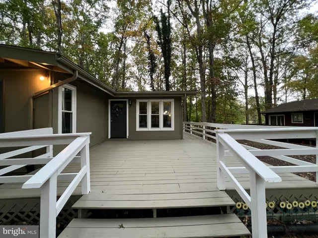 a house with trees in front of it
