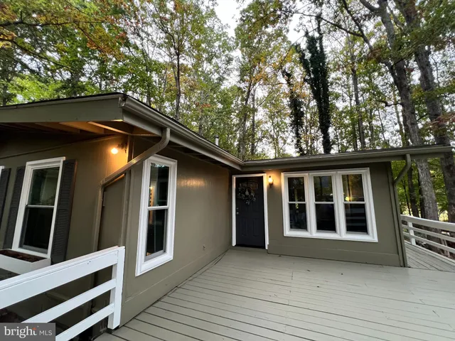 a house with trees in front of it