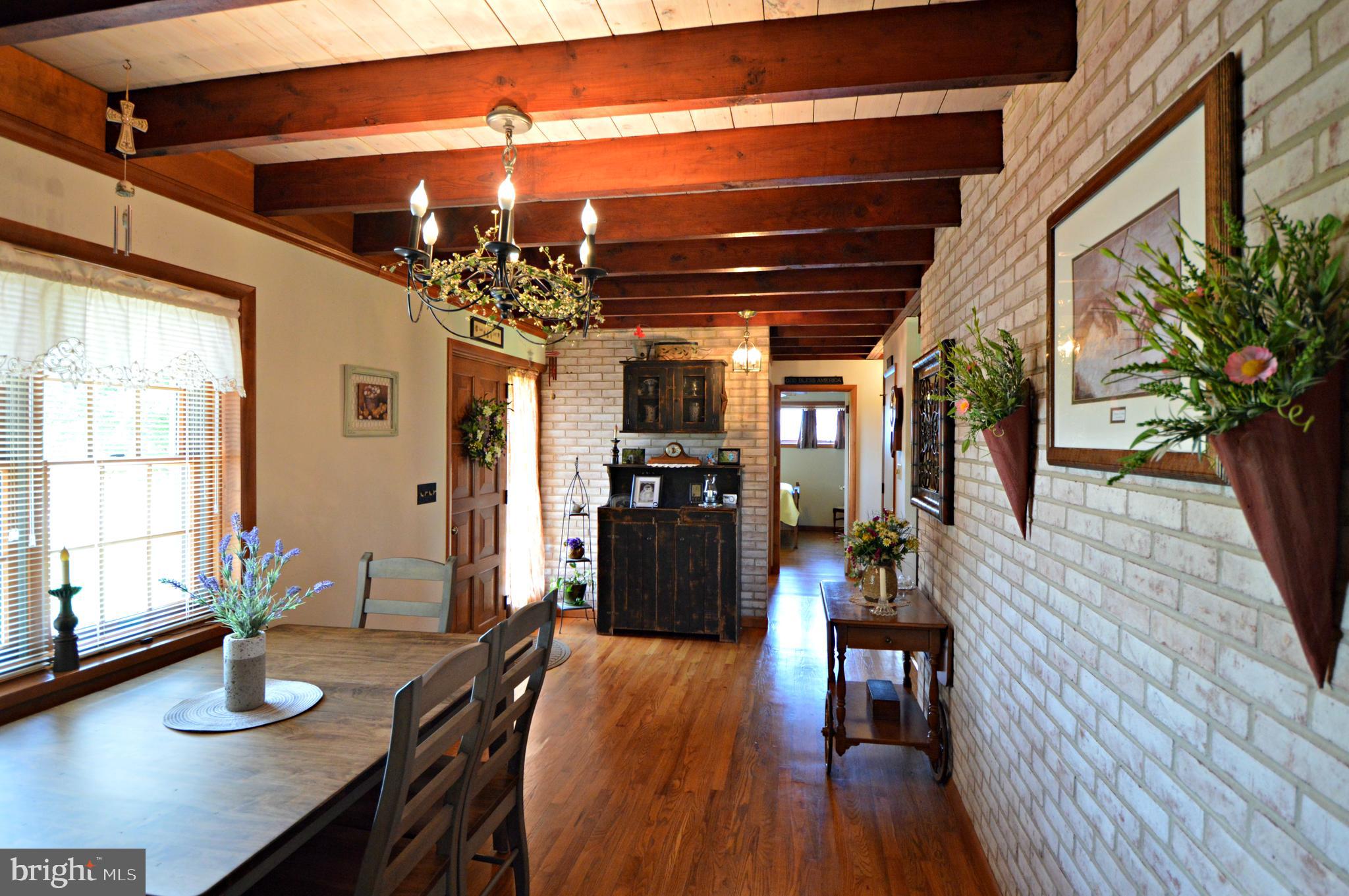 49 Oberholtzer Road Elizabethtown, PA 17022 - Photo 5 of 36 Charming structural beams & brick wall!
