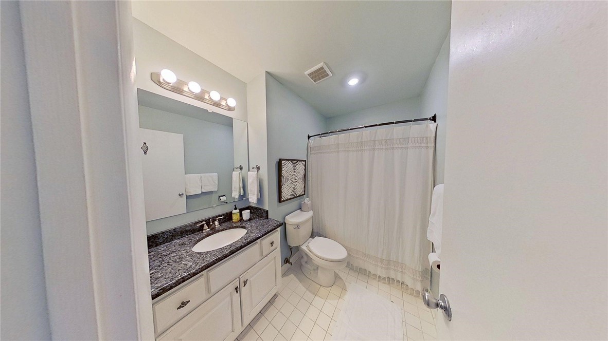 805 Mallery Street, Unit E St. Simons Island, GA 31522 - Photo 14 of 17 upstairs hall bath for 2 bedrooms