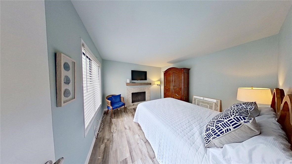 805 Mallery Street, Unit E St. Simons Island, GA 31522 - Photo 10 of 17 downstairs 4th bedroom or den w/fireplace