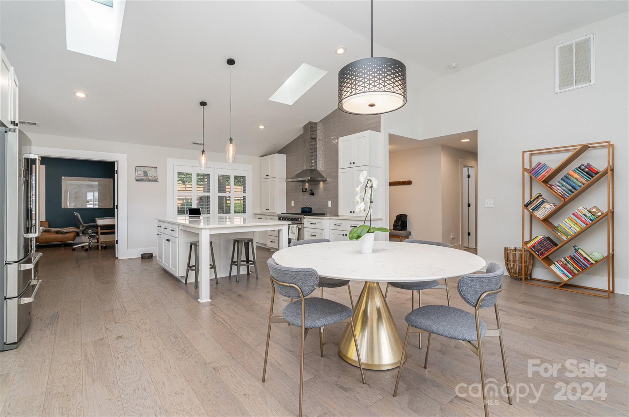 5335 Valley Forge Road Charlotte, NC 28210 - Photo 13 of 29 a large kitchen with a table and chairs