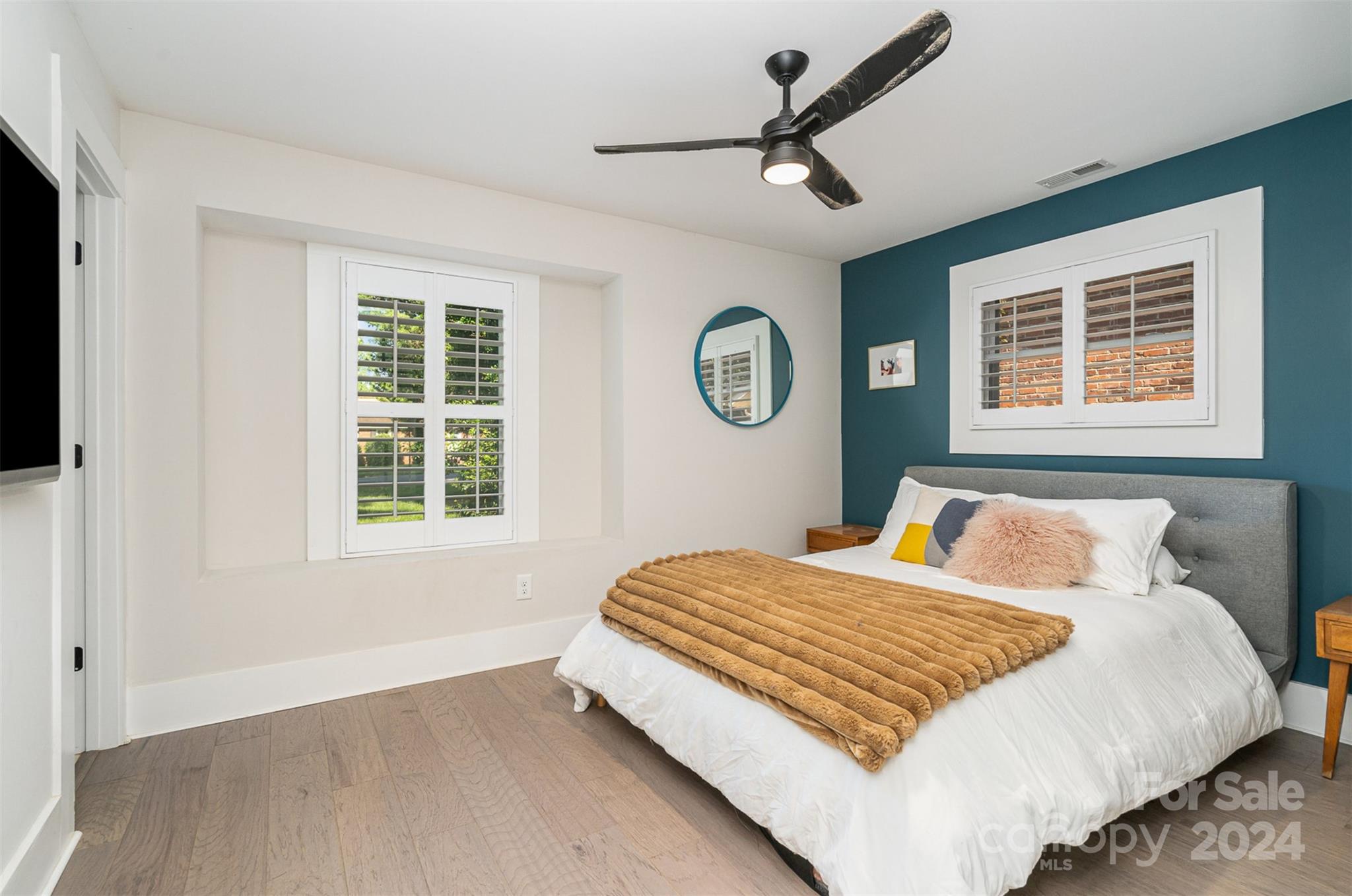 5335 Valley Forge Road Charlotte, NC 28210 - Photo 19 of 29 a bedroom with a bed and a window