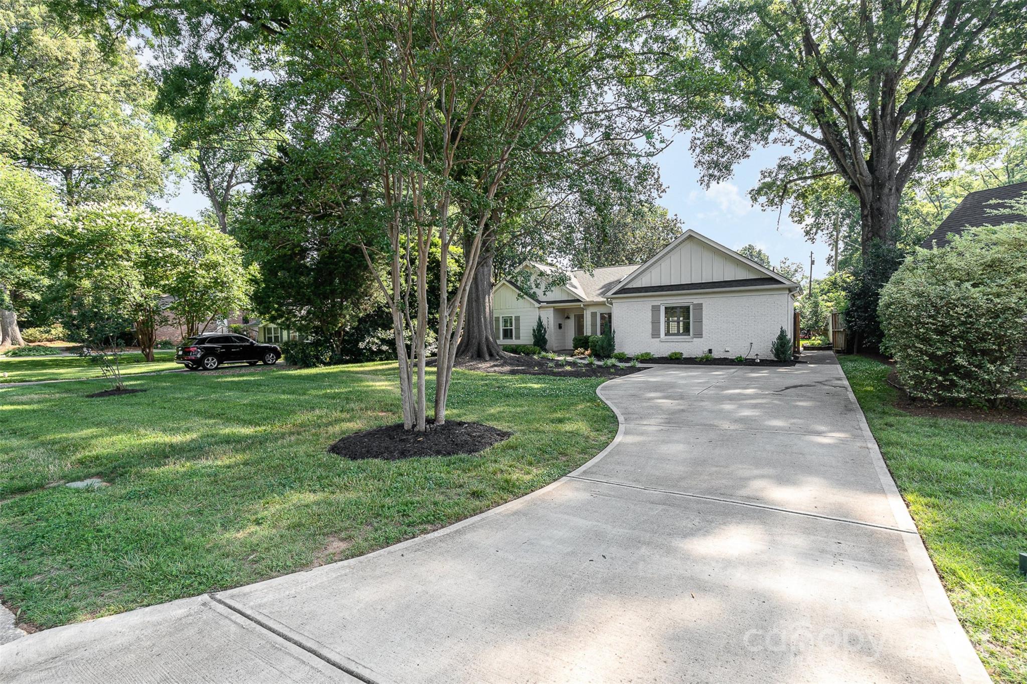 5335 Valley Forge Road Charlotte, NC 28210 - Photo 29 of 29 a front view of a house with a yard