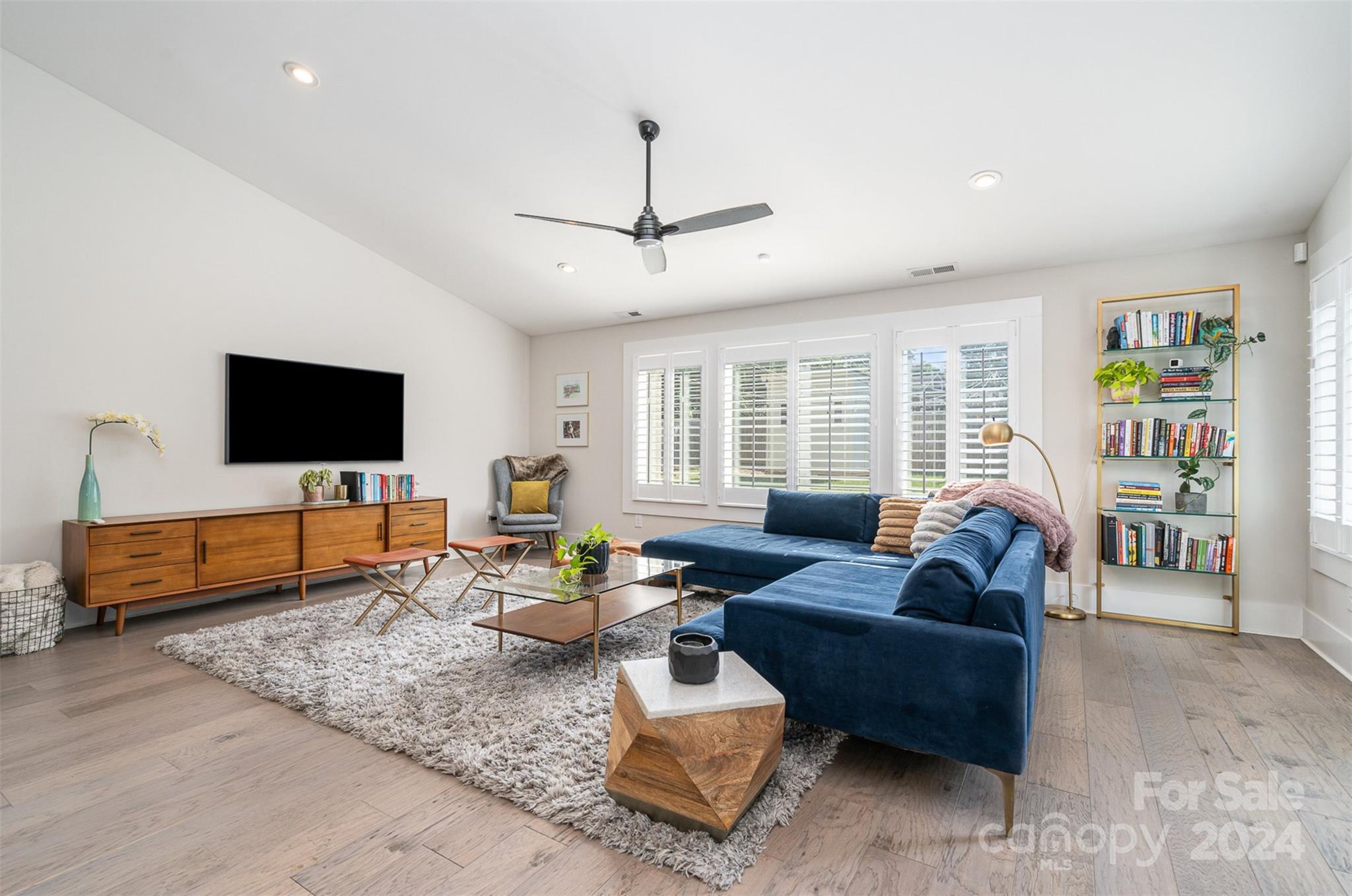 5335 Valley Forge Road Charlotte, NC 28210 - Photo 4 of 29 a living room with furniture and a flat screen tv