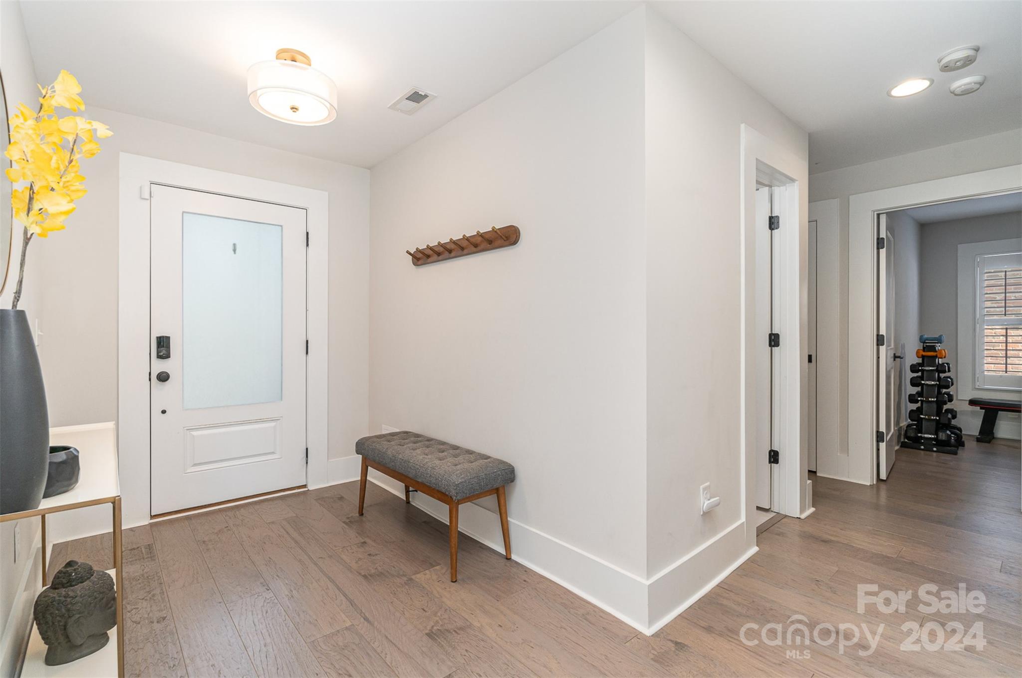 5335 Valley Forge Road Charlotte, NC 28210 - Photo 6 of 29 a view of room with furniture and wooden floor