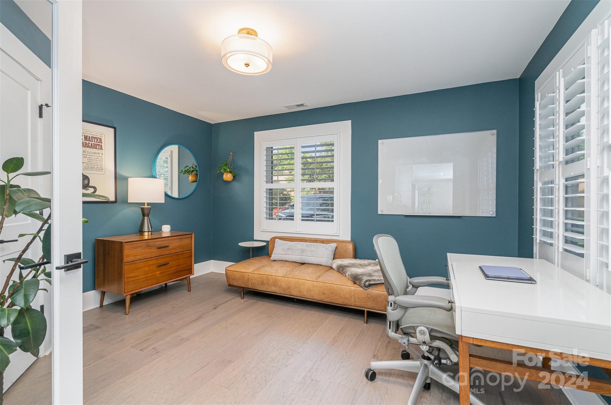 5335 Valley Forge Road Charlotte, NC 28210 - Photo 7 of 29 a bedroom with furniture and a large window