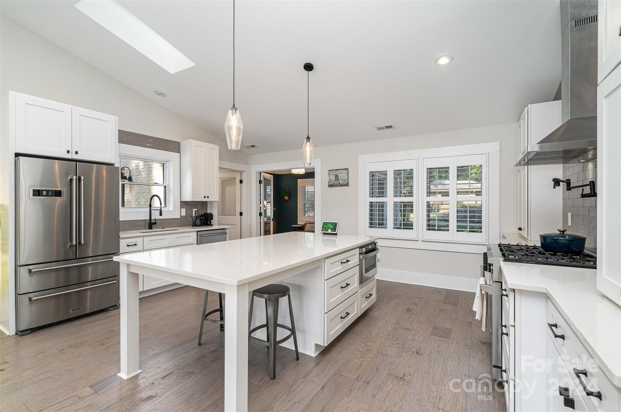 5335 Valley Forge Road Charlotte, NC 28210 - Photo 9 of 29 a kitchen that has a lot of counter space and refrigerator