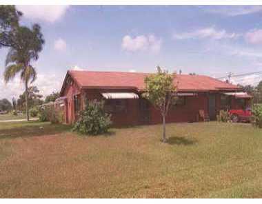 4606 Southeast Beckett Avenue Stuart, FL 34997 - Photo 1 of 1 a house view with a outdoor space