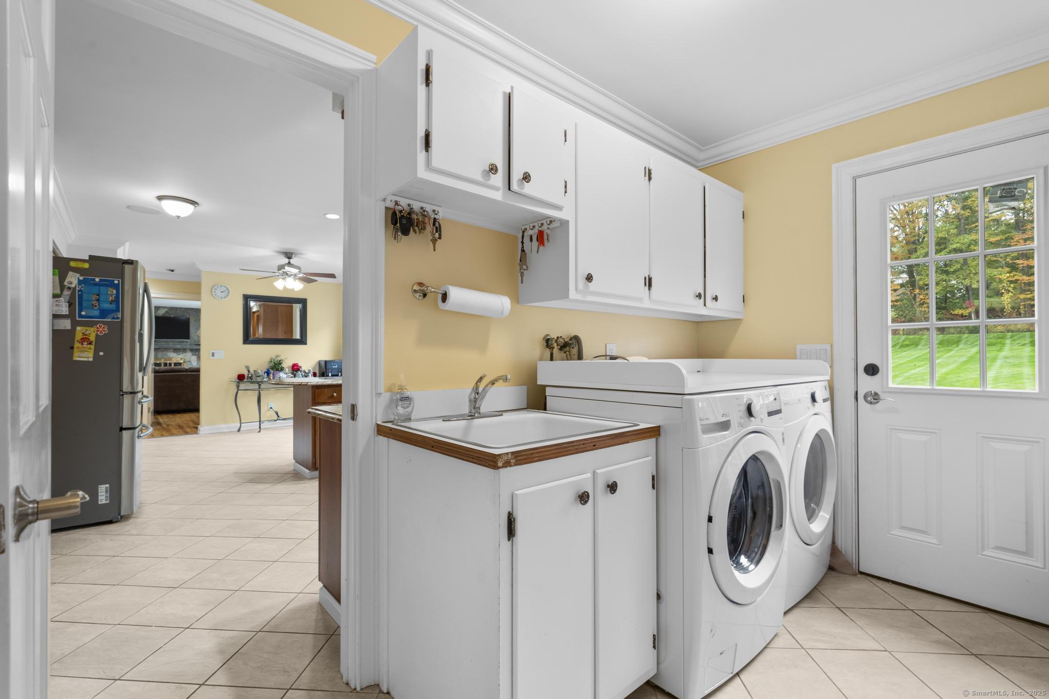 14 East Gate Road Danbury, CT 06811 - Photo 28 of 40 a view of kitchen sink and washer