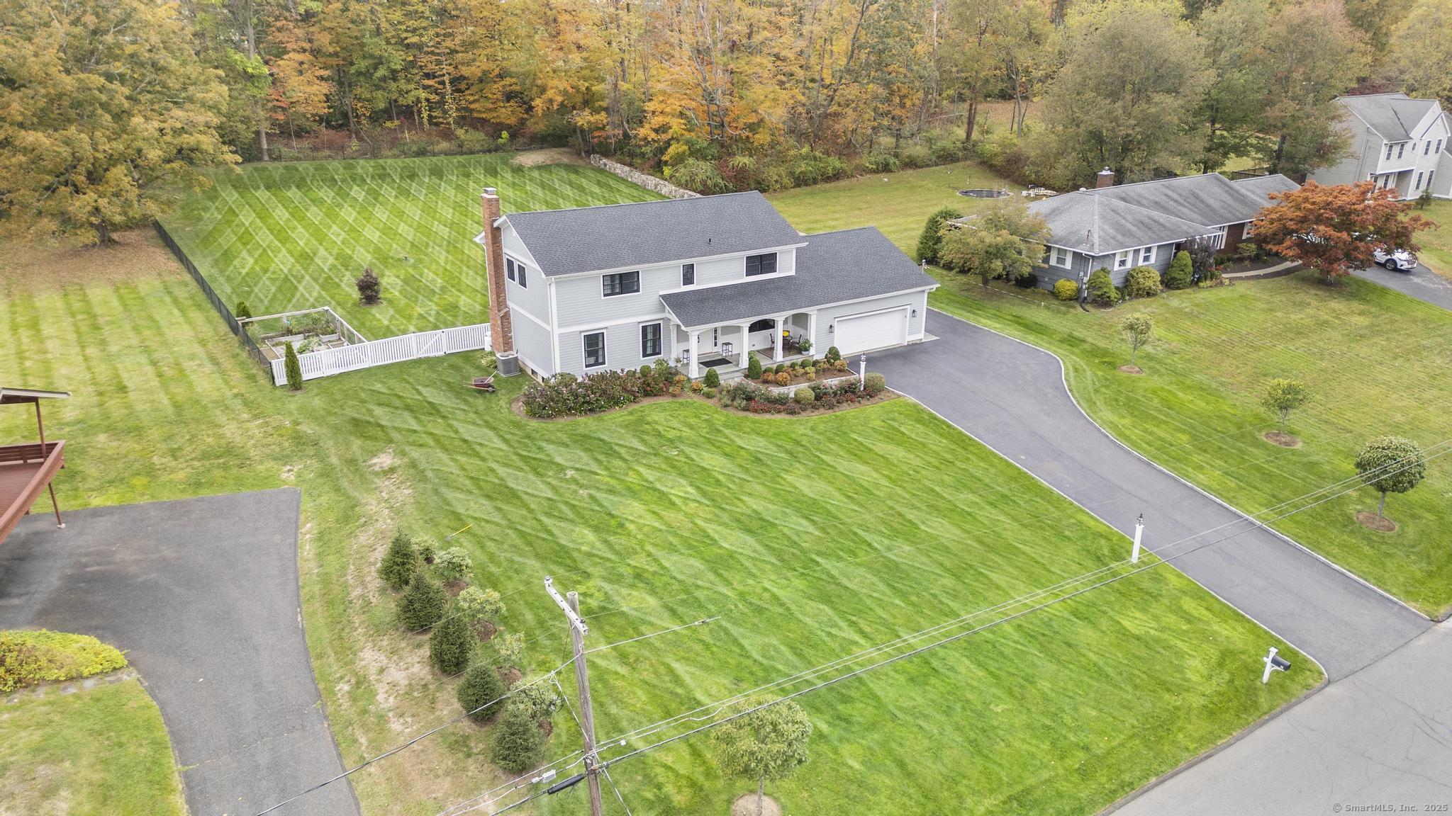 14 East Gate Road Danbury, CT 06811 - Photo 3 of 40 an aerial view of a house with garden space and street view