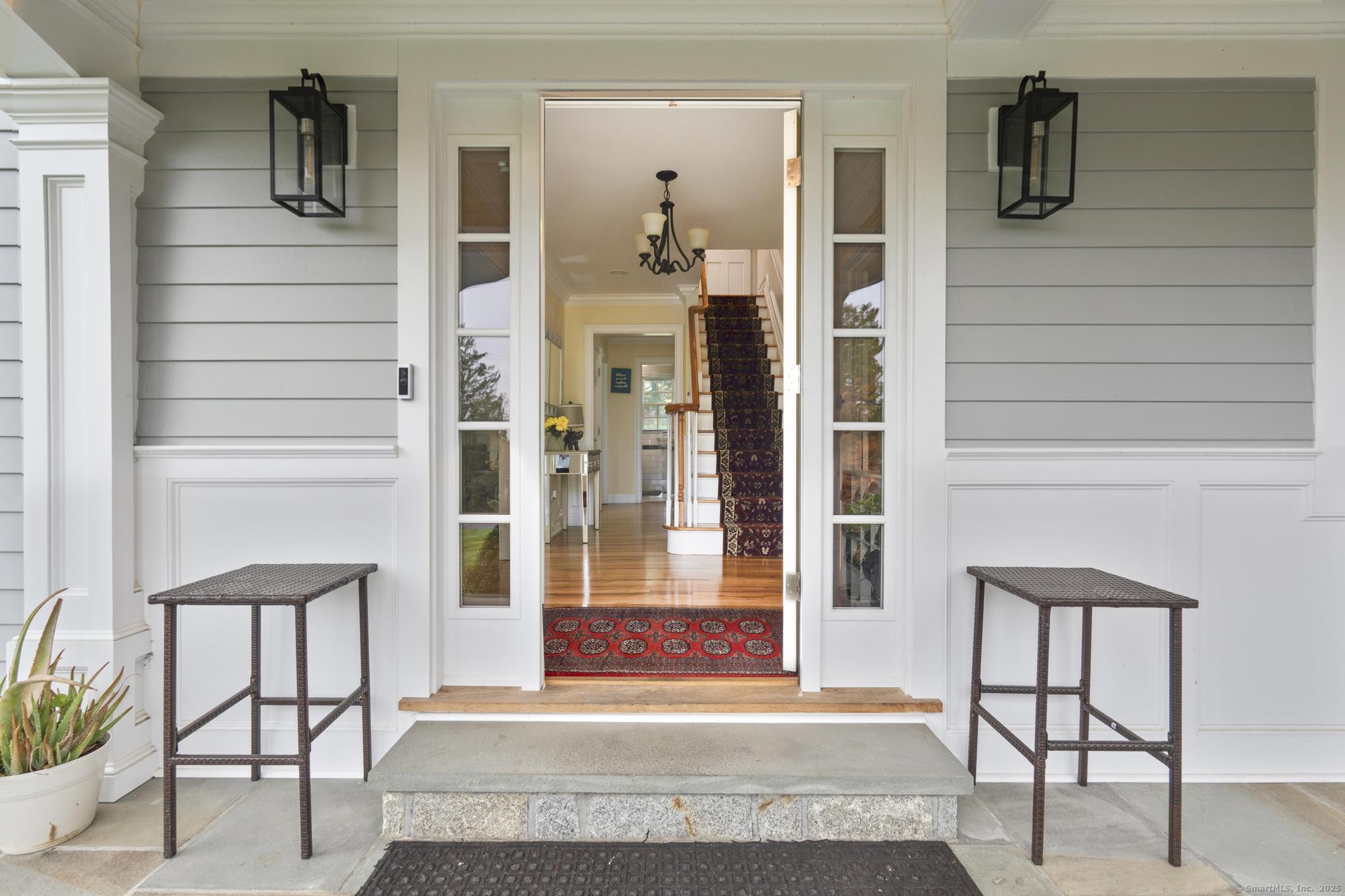 14 East Gate Road Danbury, CT 06811 - Photo 8 of 40 a view of a hallway with wooden floor and windows