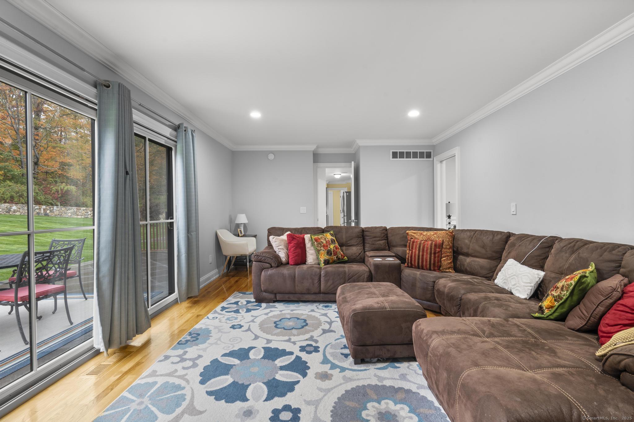 14 East Gate Road Danbury, CT 06811 - Photo 10 of 40 a living room with furniture and a floor to ceiling window