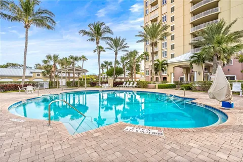 a view of a swimming pool with a garden