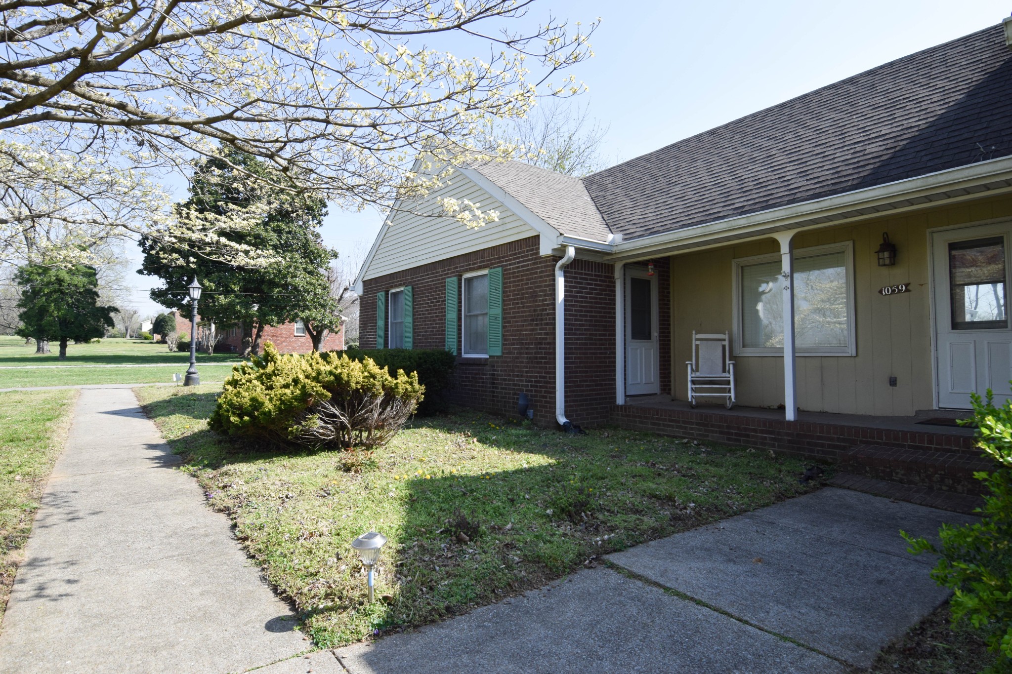 1059 Robertson Road Gallatin, TN 37066 - Photo 19 of 84 a view of a house with backyard and garden