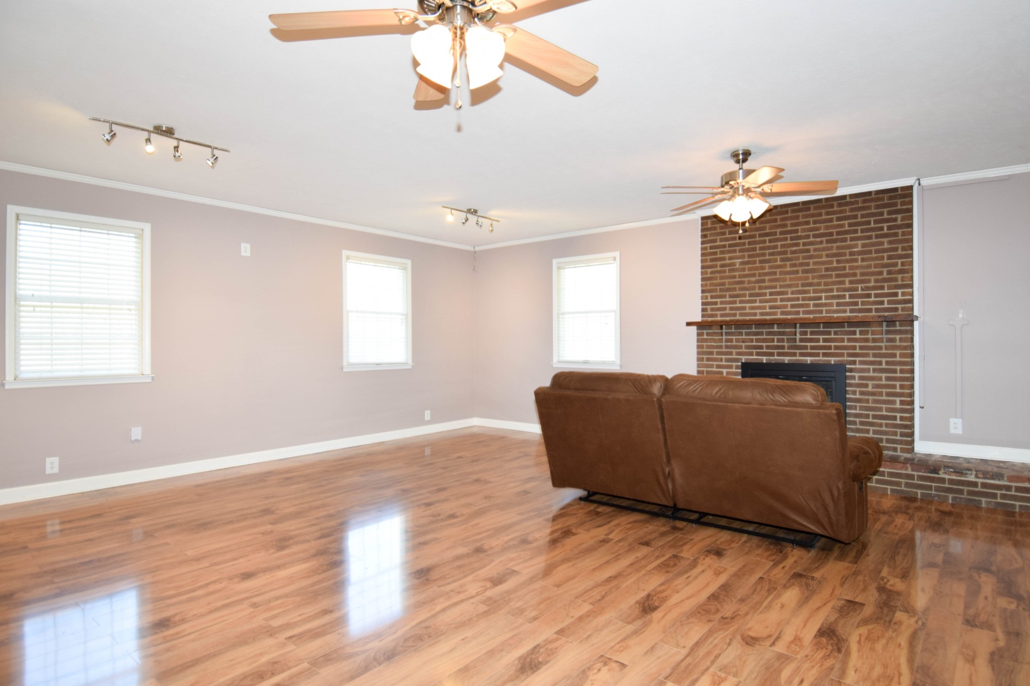 1059 Robertson Road Gallatin, TN 37066 - Photo 21 of 84 a living room with furniture and a fireplace
