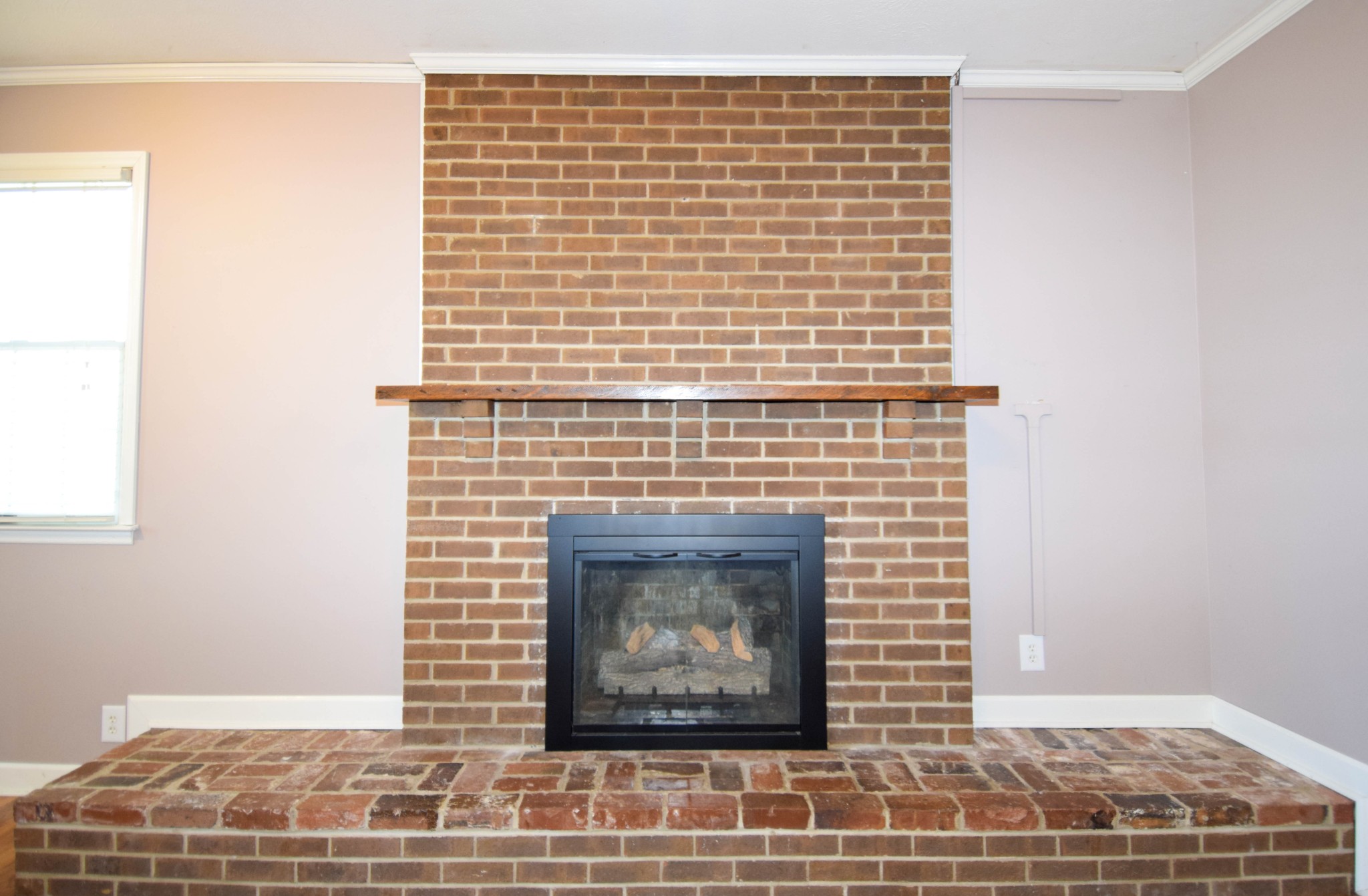 1059 Robertson Road Gallatin, TN 37066 - Photo 23 of 84 a stone house with a fireplace