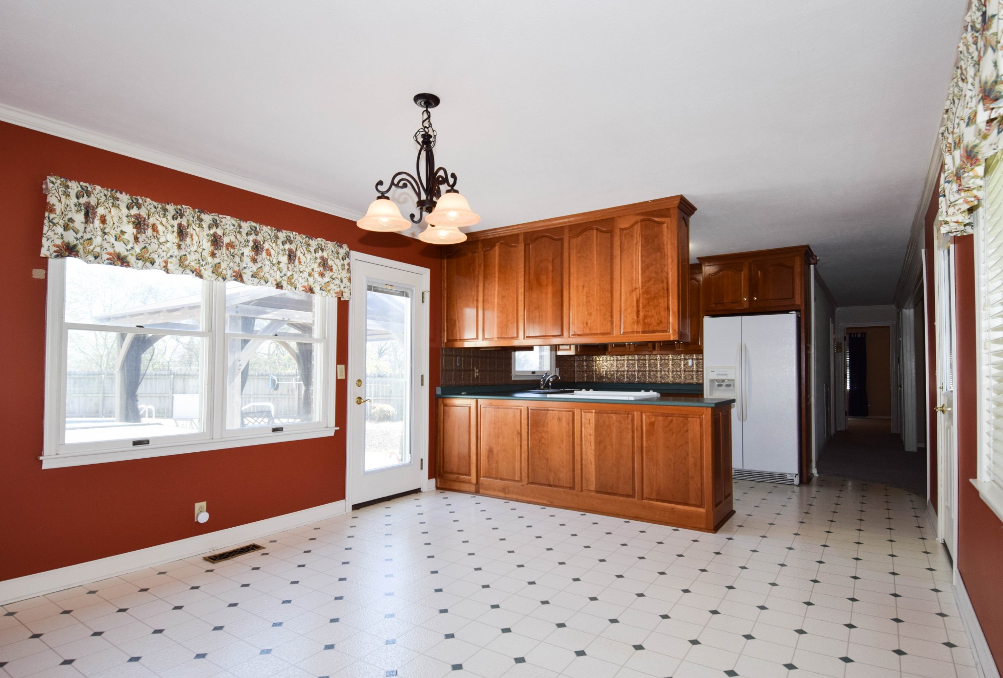 1059 Robertson Road Gallatin, TN 37066 - Photo 25 of 84 a kitchen with stainless steel appliances kitchen island granite countertop a refrigerator and a sink