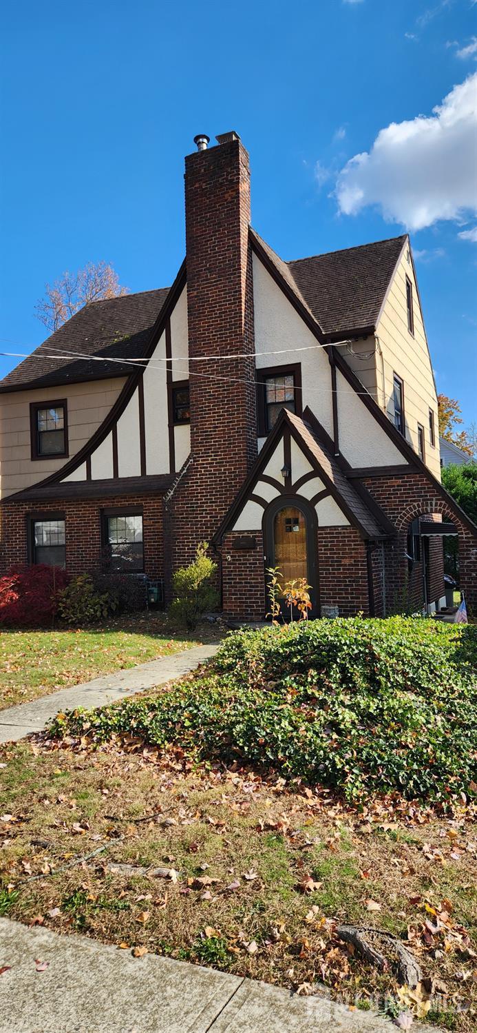 525 Edgar Road Westfield, NJ 07090 - Photo 4 of 9 a front view of a house with a yard