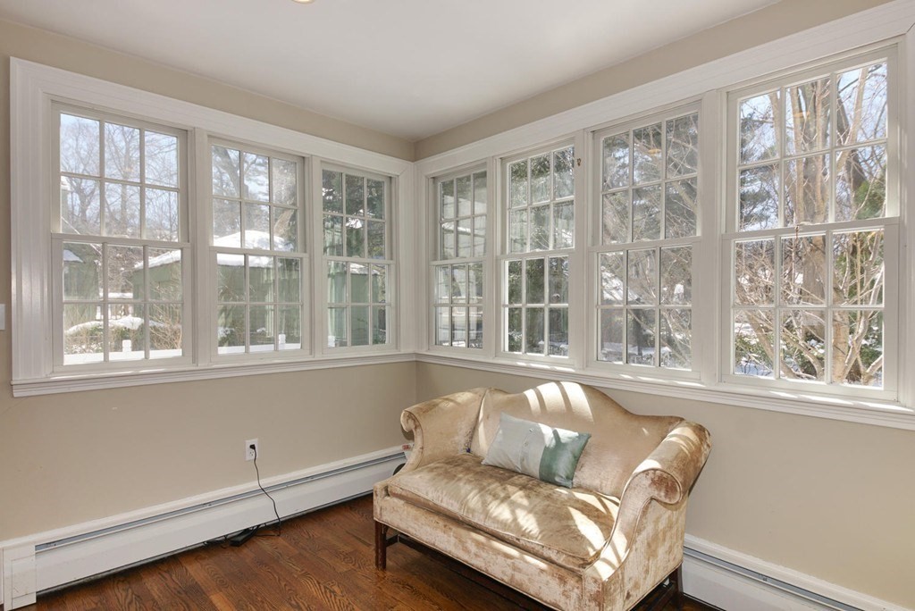 204 Pleasant Street Newton, MA 02459 - Photo 6 of 27 a living room with furniture and a large window