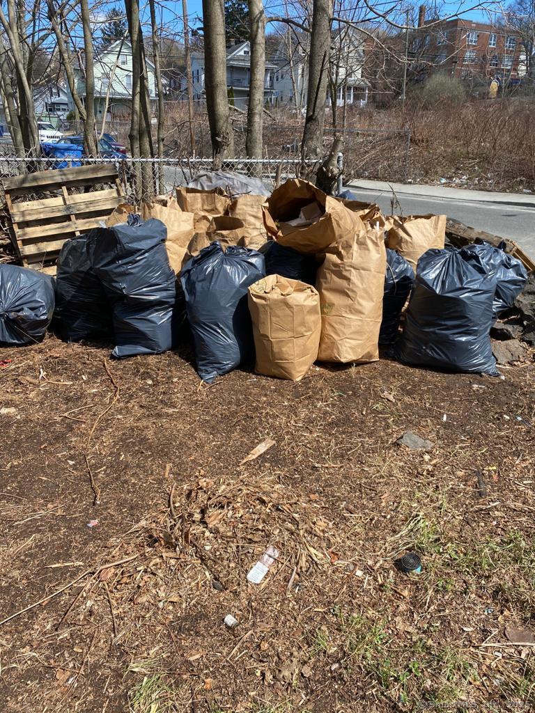 25 Violet Street Waterbury, CT 06704 - Photo 2 of 4 a view of a lake with couches and chairs