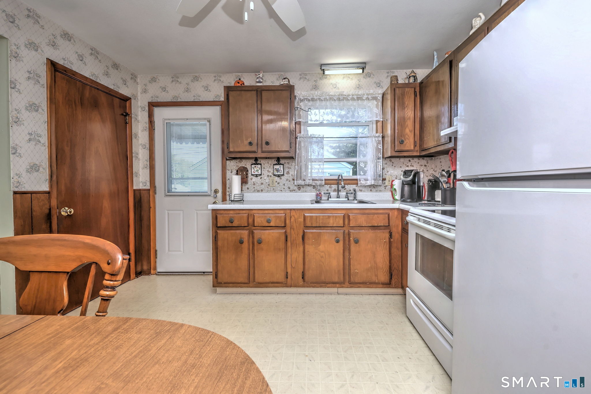 212 Swain Avenue Meriden, CT 06450 - Photo 20 of 38 a kitchen with a sink appliances and cabinets