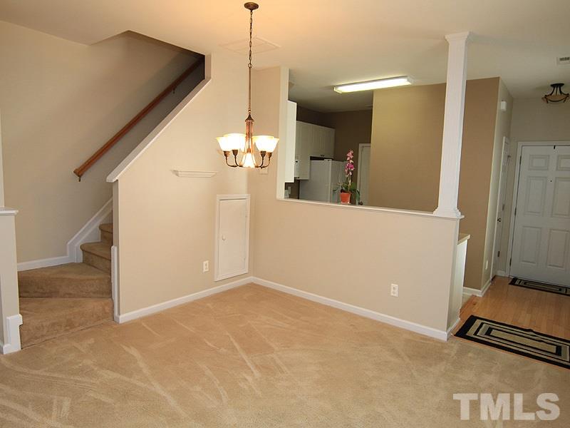 2328 Persimmon Ridge Drive Raleigh, NC 27604 - Photo 3 of 12 a view of a room with a hallway