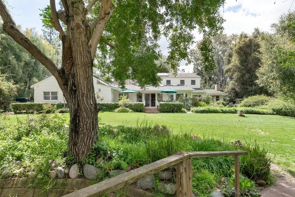 13636 Jack Rabbit Road Poway, CA 92064 - Photo 2 of 29 a front view of a house with a yard