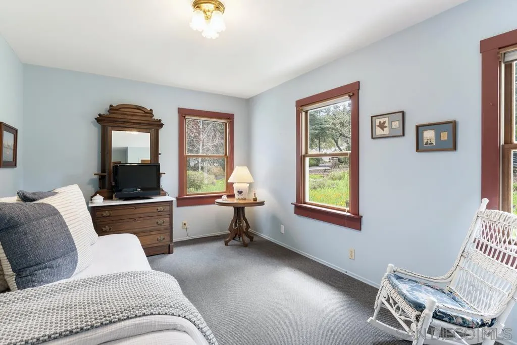 13636 Jack Rabbit Road Poway, CA 92064 - Photo 21 of 29 a living room with furniture and a window