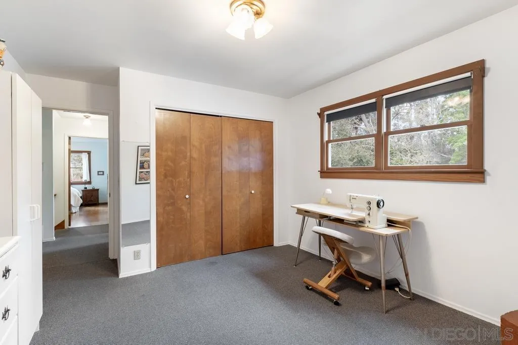 13636 Jack Rabbit Road Poway, CA 92064 - Photo 25 of 29 a view of a workspace with furniture and a window