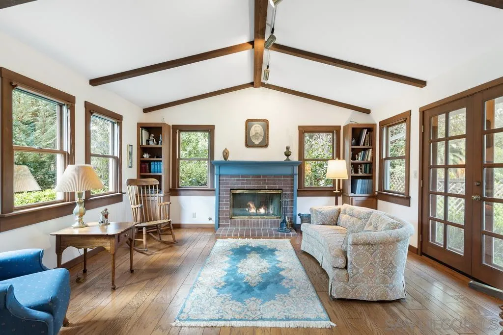 13636 Jack Rabbit Road Poway, CA 92064 - Photo 9 of 29 a living room with furniture a window and a fireplace