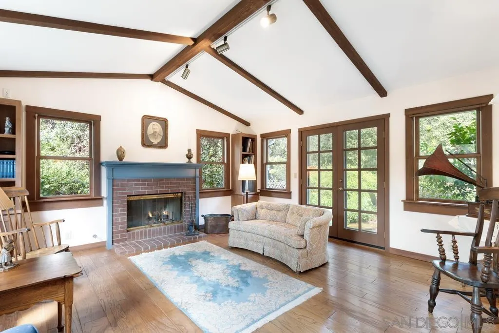 13636 Jack Rabbit Road Poway, CA 92064 - Photo 10 of 29 a living room with furniture and a fireplace