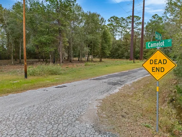a view of a park with welcome board