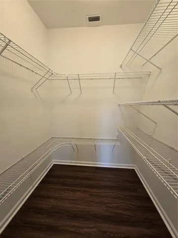 a view of a room with racks on the wall