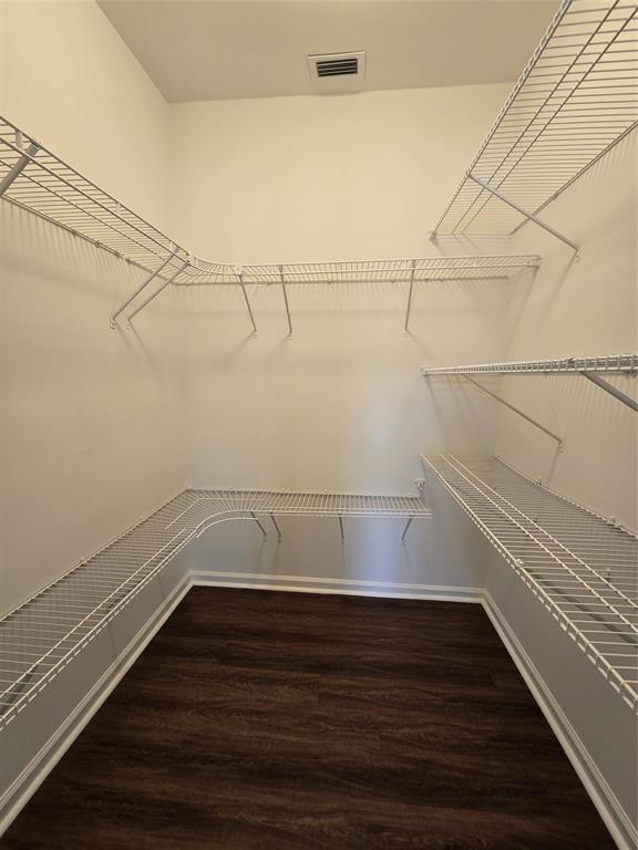 5800 Coach House Circle, Unit D Boca Raton, FL 33486 - Photo 14 of 23 a view of a room with racks on the wall