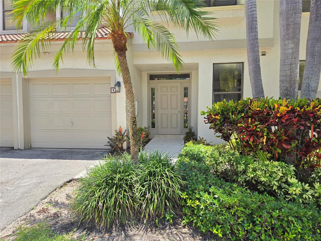 5800 Coach House Circle, Unit D Boca Raton, FL 33486 - Photo 2 of 23 front view of a house