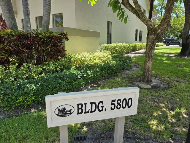 a street sign on a pole on a street