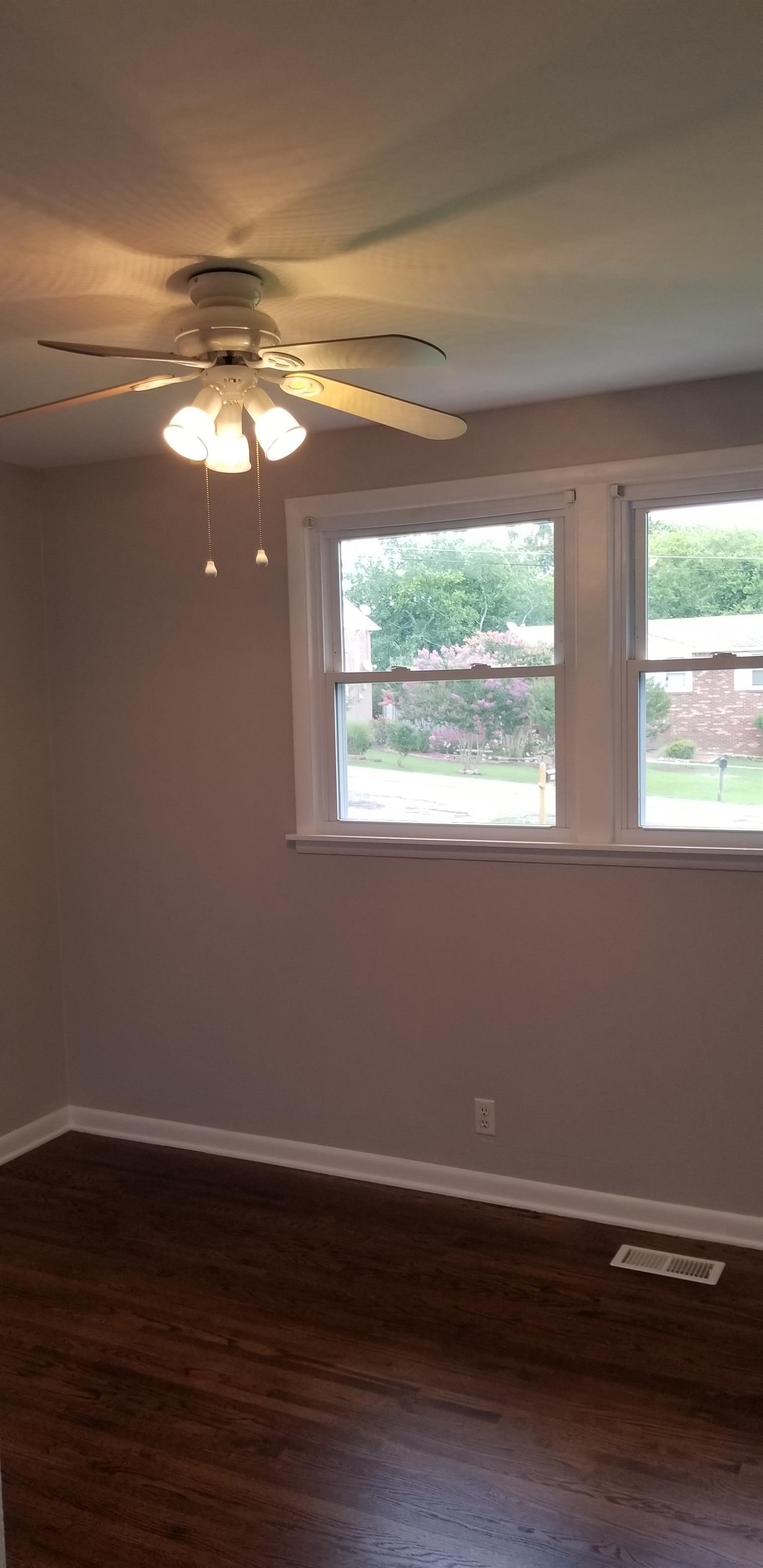 207 South Valley Road Hendersonville, TN 37075 - Photo 12 of 21 a view of room with window and wooden floor